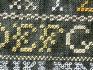 A New England Sampler Worked on Green Linen, circa 1810 - Scarlet Letter